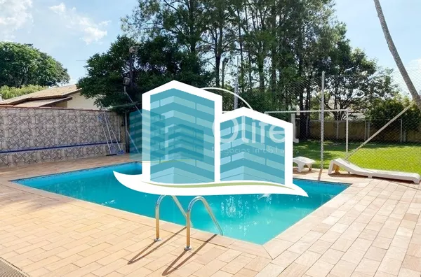 Excelente casa térrea a venda no Condomínio Parque Shangrilá na cidade de Campinas. Muita natureza e verde envolvem esse imóvel. A casa principal tem 3 dormitórios, sendo 1 suíte com closet, sala, cozinha e banheiro. Possui uma casa anexa, com sala, quart - Foto 21