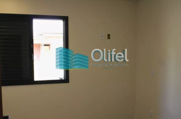 Excelente casa térrea em condomínio fechado na cidade de Louveira com 3 dormitórios, sendo 1 suíte, sala ampla para 2 ambientes, pé direito duplo, lavabo, banheiro social, conceito integrado, área gourmet e quintal.  Agende a sua visita - Foto 14