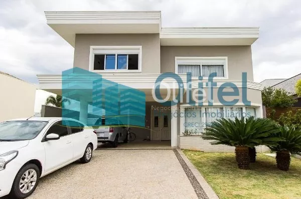 Excelente sobrado no Condomínio Swiss park na cidade de Campinas com excelente acabamento com 4 dormitórios, sendo 2 amplas suítes, closet, hidromassagem, amplas salas de estar, jantar com ambientes integrados ao lazer, sala de cinema, dependência de serv - Foto 1