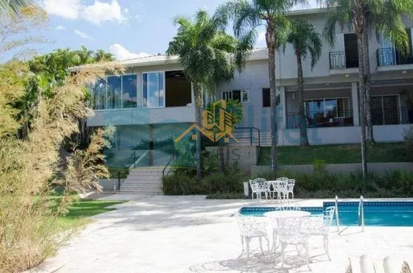 Casa residencial à venda, condomínio Estância Marambaia, Vinhedo. Maravilhosa casa, implantada em 4 lotes unificados que são passíveis de desmembramento, recentemente reformada, possui sala de estar com varanda e lago de carpas, sala de jantar, home theat - Foto 36