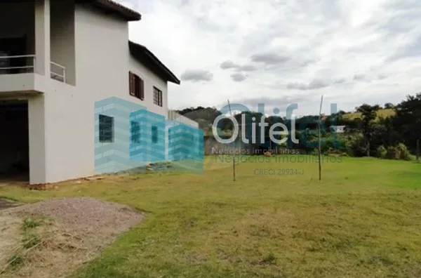Linda casa em condomínio fechado na cidade de  Vinhedo, 698 m² área construída, 1450,00 m² de terreno, 5 dormitórios sendo 2 suítes, living 4 ambientes, 4 banheiros, 6 vagas de garagem cobertas, piscina, local com muito verde e tranquilidade.  Venha morar - Foto 16