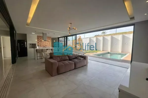 Linda casa no  condomínio  Santa Isabel na cidade de Louveira para quem procura espaço, modernismo, sofisticação, sossego e excelente iluminação. O imóvel dispõe de 525m² de terreno e 414m² de construção. O piso inferior oferece sala ampla  para 2 ambient - Foto 8