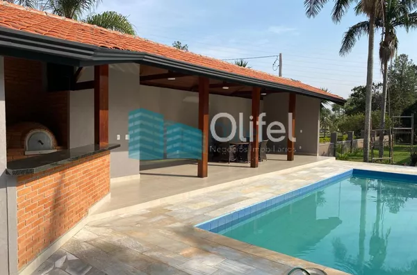 Excelente casa à venda no Condomínio São Joaquim,. Próxima ao lago, iluminação natural e muito arejada. No piso inferior a casa possui um espaço para home office, salão de jogos ou festas, 2 dormitórios e 1 suíte. No piso superior são 3 suítes sendo 1 mas - Foto 32