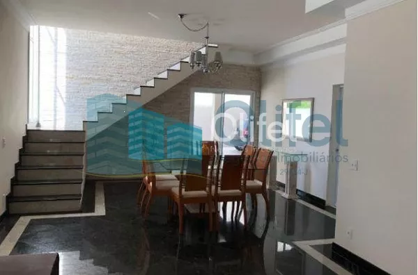 Sobrado em condomínio na cidade de Louveira,  com 3 dormitórios, 2 suítes, sendo 1 master com closet, escritório, sala 3 ambientes, home theater, ampla cozinha rica em armários, despensa, lavanderia, área gourmet com varanda, piscina aquecida, todo piso e - Foto 18
