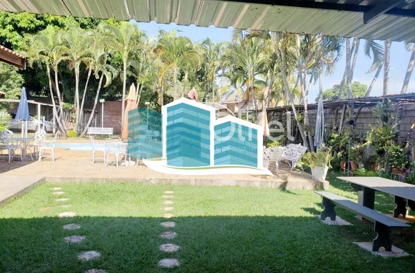 Excelente casa térrea a venda no Condomínio Parque Shangrilá na cidade de Campinas. Muita natureza e verde envolvem esse imóvel. A casa principal tem 3 dormitórios, sendo 1 suíte com closet, sala, cozinha e banheiro. Possui uma casa anexa, com sala, quart - Foto 15
