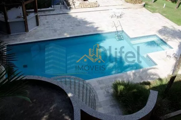 Casa residencial à venda, condomínio Estância Marambaia, Vinhedo. Maravilhosa casa, implantada em 4 lotes unificados que são passíveis de desmembramento, recentemente reformada, possui sala de estar com varanda e lago de carpas, sala de jantar, home theat - Foto 27