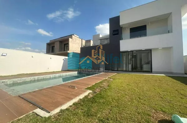 Linda casa no  condomínio  Santa Isabel na cidade de Louveira para quem procura espaço, modernismo, sofisticação, sossego e excelente iluminação. O imóvel dispõe de 525m² de terreno e 414m² de construção. O piso inferior oferece sala ampla  para 2 ambient - Foto 1