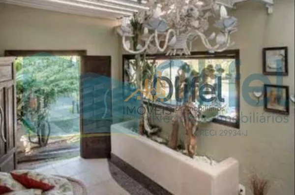 Excelente casa, estilo chácara, com belíssimo acabamento na cidade de Louveira com 1200 m² AT | 500 m² AC, sendo 03 dormitórios, sendo 1 master com closet, 03 banheiros, sala de TV, estar e jantar, lareira, adega, cozinha integrada rica em armários e i - Foto 25