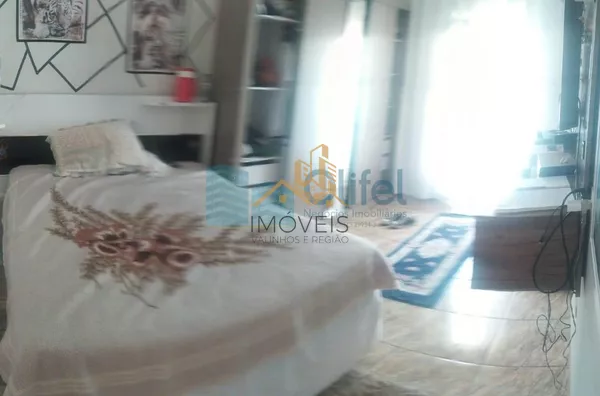 Excelente sobrado em bairro residencial próximo ao centro na cidade de Louveira, com 3 suítes com planejados, avarandada, 2 amplas salas, cozinha planejada, área gourmet com churrasqueira, quintal, 2 vagas de garagem.  Agende a sua visita. - Foto 8