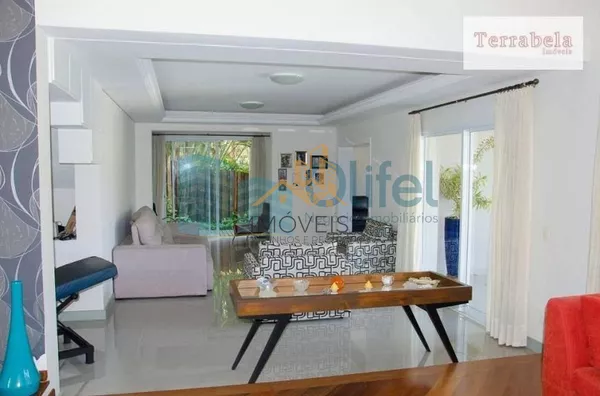 Casa residencial à venda, condomínio Estância Marambaia, Vinhedo. Maravilhosa casa, implantada em 4 lotes unificados que são passíveis de desmembramento, recentemente reformada, possui sala de estar com varanda e lago de carpas, sala de jantar, home theat - Foto 12