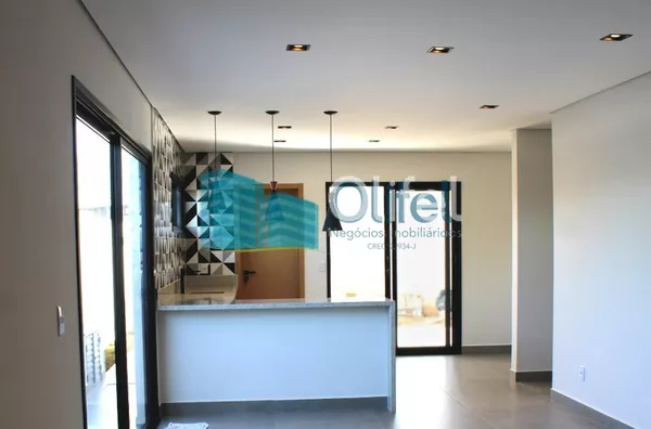 Excelente casa térrea em condomínio fechado na cidade de Louveira com 3 dormitórios, sendo 1 suíte, sala ampla para 2 ambientes, pé direito duplo, lavabo, banheiro social, conceito integrado, área gourmet e quintal.  Agende a sua visita - Foto 6