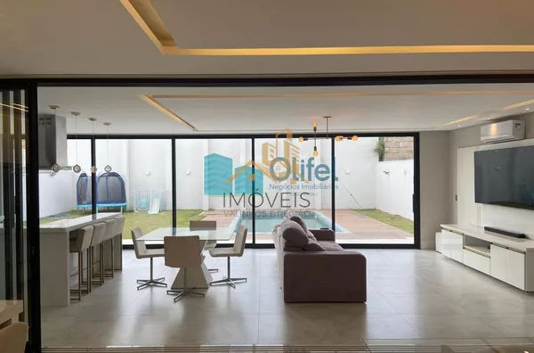 Linda casa no  condomínio  Santa Isabel na cidade de Louveira para quem procura espaço, modernismo, sofisticação, sossego e excelente iluminação. O imóvel dispõe de 525m² de terreno e 414m² de construção. O piso inferior oferece sala ampla  para 2 ambient - Foto 11