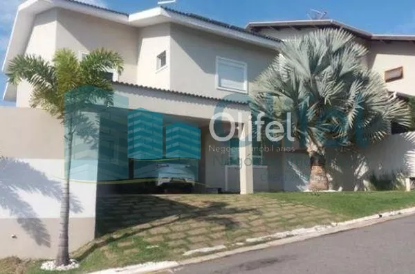 Sobrado em condomínio na cidade de Louveira,  com 3 dormitórios, 2 suítes, sendo 1 master com closet, escritório, sala 3 ambientes, home theater, ampla cozinha rica em armários, despensa, lavanderia, área gourmet com varanda, piscina aquecida, todo piso e - Foto 1