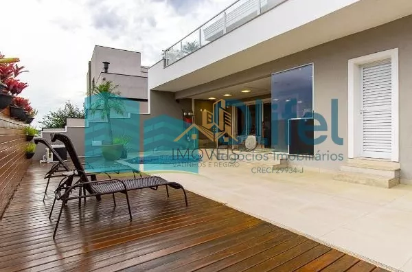 Excelente sobrado no Condomínio Swiss park na cidade de Campinas com excelente acabamento com 4 dormitórios, sendo 2 amplas suítes, closet, hidromassagem, amplas salas de estar, jantar com ambientes integrados ao lazer, sala de cinema, dependência de serv - Foto 13