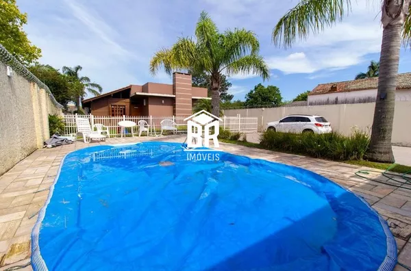 Terreno com 3 casas individuais