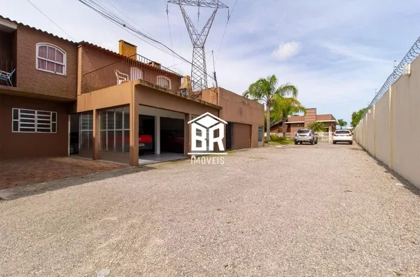 Terreno com 3 casas individuais