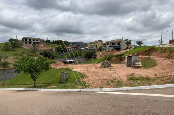 *TERRENO COM 1.250 M², CONDOMÍNIO PORTAL DO SOL. - Foto 1