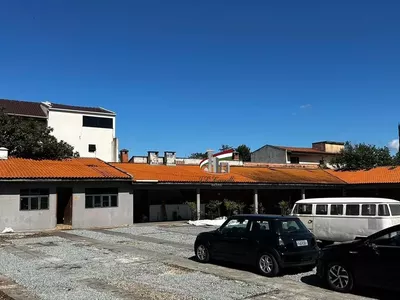 Loja comercial de esquina com 1210m² para alugar no Novo Mundo - Foto 12