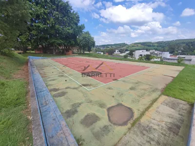 Terreno à venda no condomínio Portal do Horto, com 222,90m² e declive ao fundo. - Foto 12