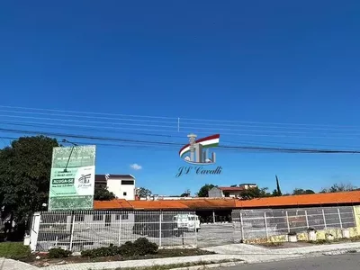 Loja comercial de esquina com 1210m² para alugar no Novo Mundo - Foto 2